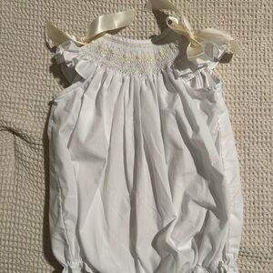 Beautiful Bow Peep Smocked Bubble Size 9 months.